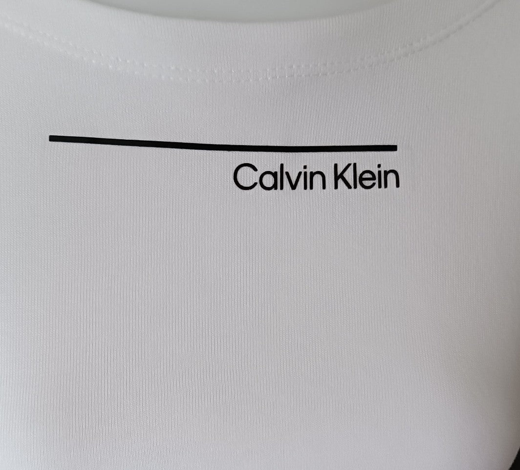 Calvin Klein Swimwear — Box Fit Crop Top Blanc taille S Calvin Klein