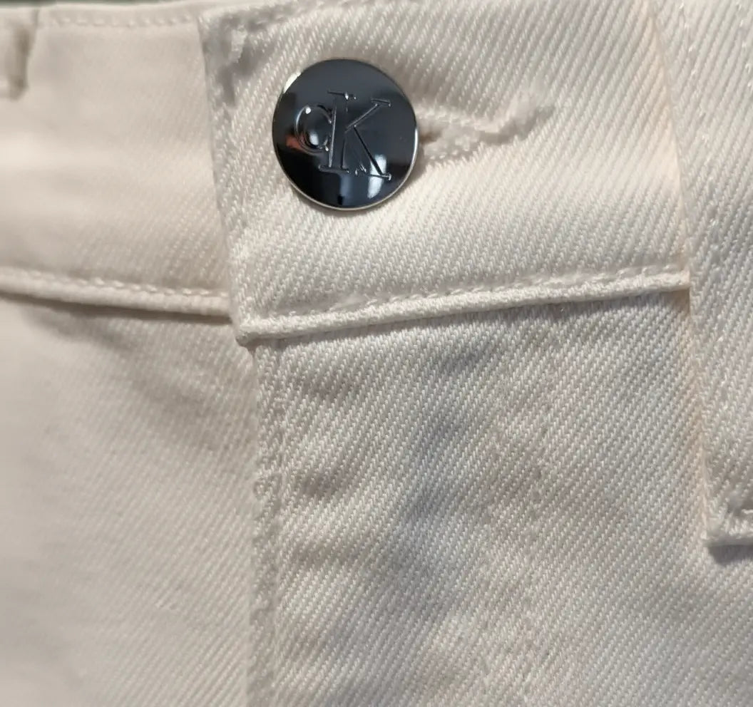 Détail bouton CK - Haute qualité