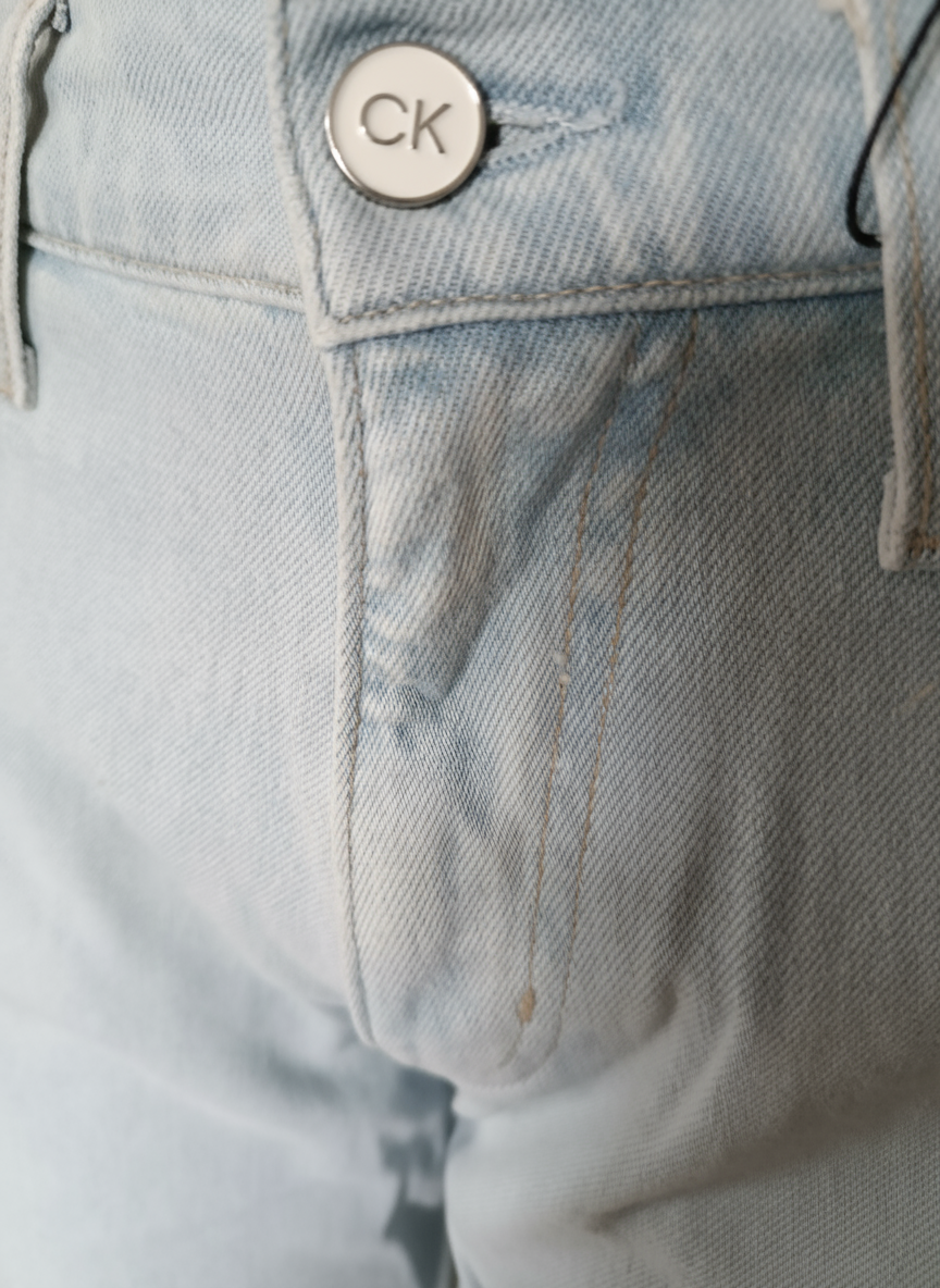 Photo améliorée du bouton CK et ceinture